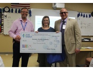 Pictures of teacher impact grant check deliveries to various schools throughout the OCPS school district.